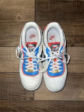 Nike White Sneakers with Blue and Red Accents